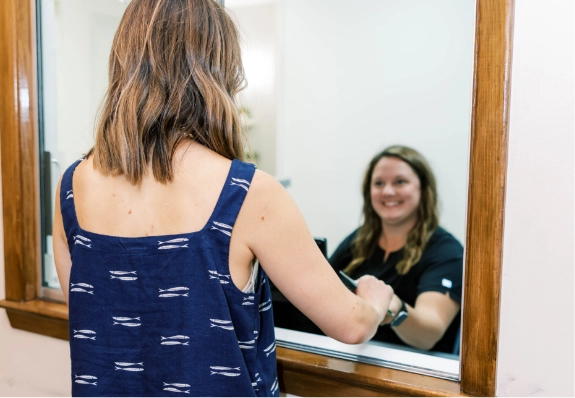 patients speaking with receptionist